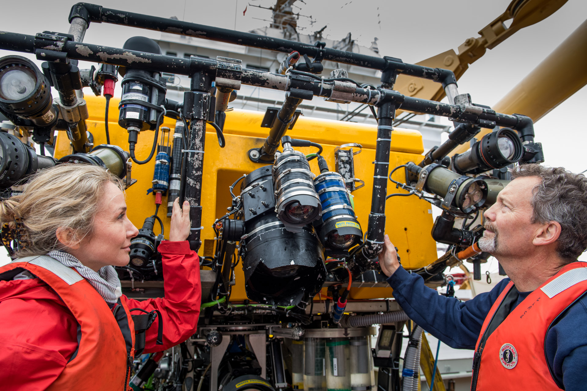 Onboard the Martha L. Black, Robert Rangeley (right), Director of Science at Oceana Canada and Alexandra Cousteau, Senior Oceana Advisor, inspect the ROPOS after a dive. The ROPOS is a state-of-the-art underwater robot that can collect samples and scientific data as well as high definition video while submerged during the Gulf of St. Lawrence Expedition. The expedition is a joint venture between Oceana Canada and Fisheries and Oceans Canada.