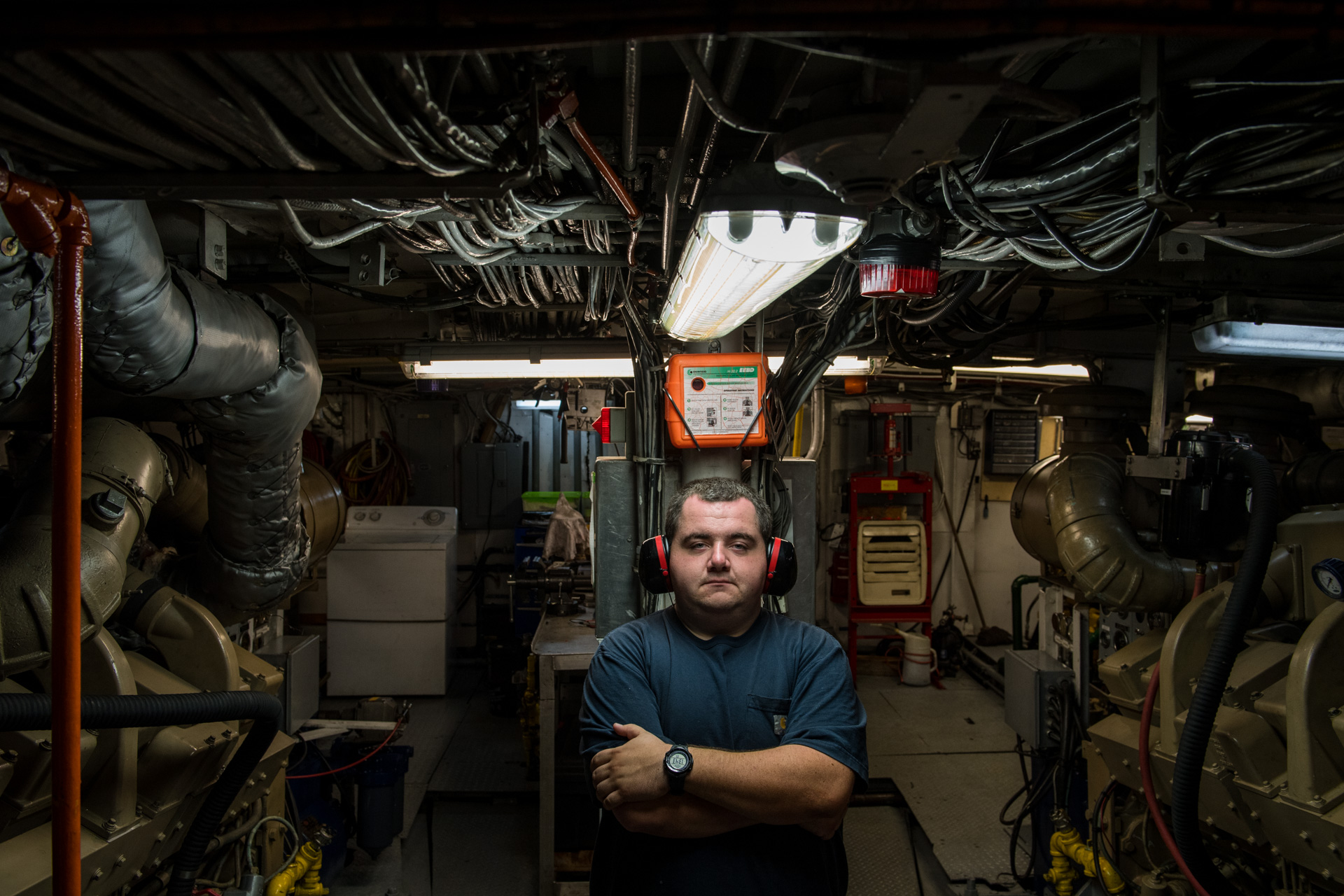 2nd Engineer Jonathan Whitson in the engine room onboard Leeway Odyssey during the Gulf of St. Lawrence Expedition, a joint venture between Oceana Canada and Fisheries and Oceans Canada.
